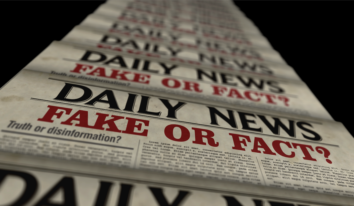 Una serie di giornali sovrapposti con i titoli "Falso o Vero?" e "Notizie quotidiane" ripetuti più volte. I titoli sono in evidenza in grassetto rosso e nero, mettendo in dubbio l'autenticità delle notizie.
