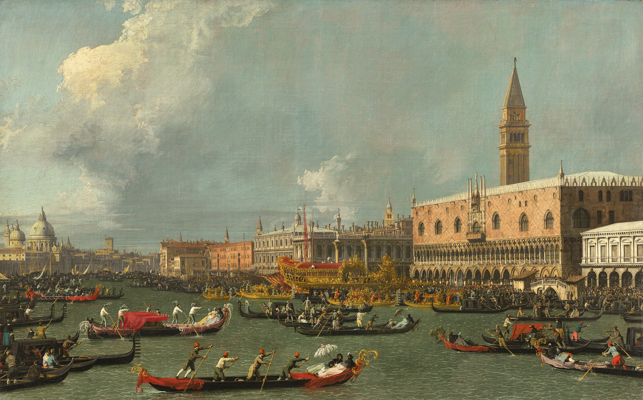Un dipinto storico del Canal Grande di Venezia, affollato di gondole e barche. Sono visibili Palazzo Ducale e il Campanile di San Marco, mentre la gente festeggia durante una grande festa sotto un cielo parzialmente nuvoloso.