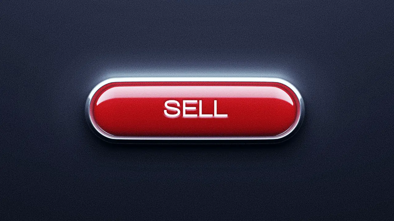 Un pulsante rosso lucido con la parola "SELL" in bianco, centrata su uno sfondo scuro.