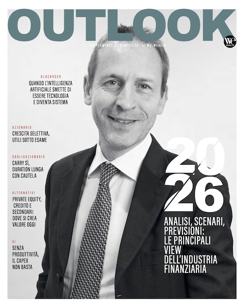 A man in a suit and tie on a magazine cover.