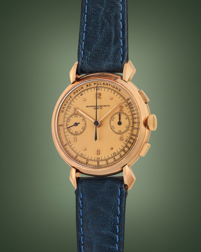 Orologio Vacheron Constantin in oro con quadrante champagne, cronografo e cinturino blu.