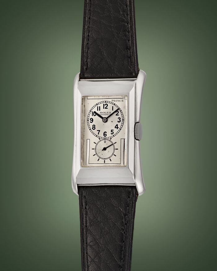 Orologio da polso rettangolare Rolex Prince con cinturino in pelle nera.