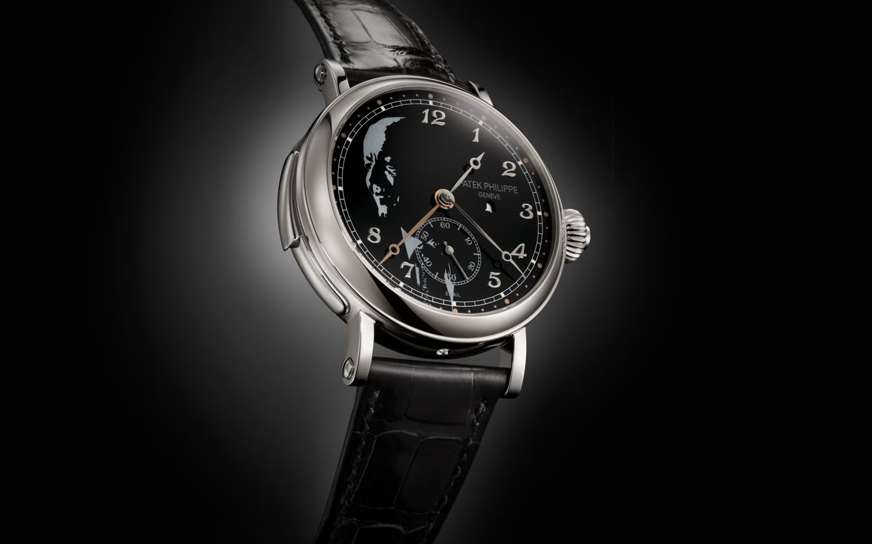 Orologio da polso Patek Philippe con quadrante nero, ritratto e cinturino in pelle.