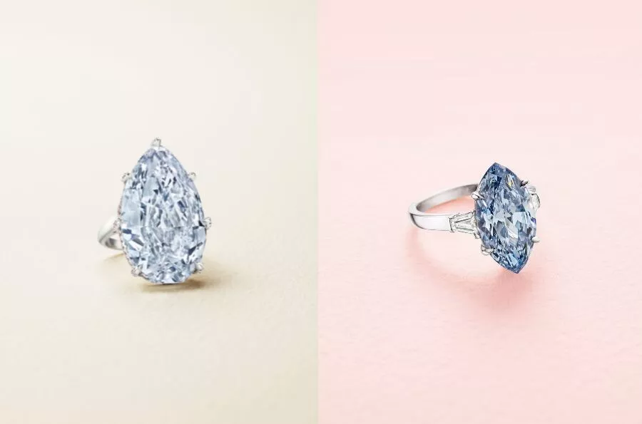 Due anelli con diamanti blu, uno a goccia, l'altro a forma di marquise.