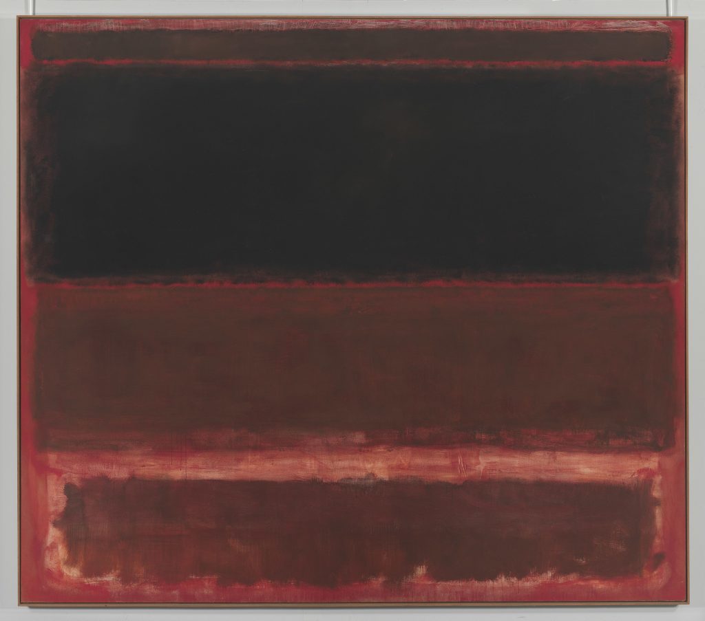 Tavolozza di colori scuri e terrosi con strisce sfumate di rosso e nero.