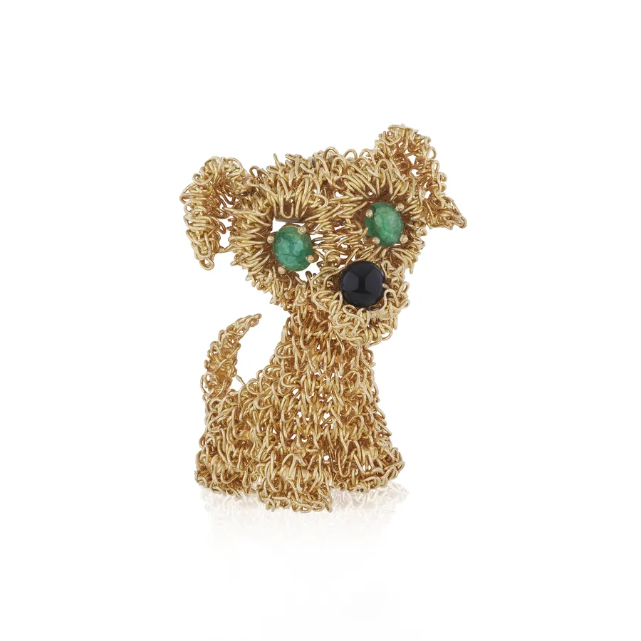 Spilla a forma di cane in filo d'oro con occhi di smeraldo e naso di onice nell'asta gioielli Phillips di Ginevra a novembre 2026