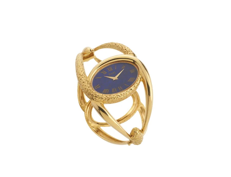Orologio da polso in oro giallo con quadrante blu e numeri romani.